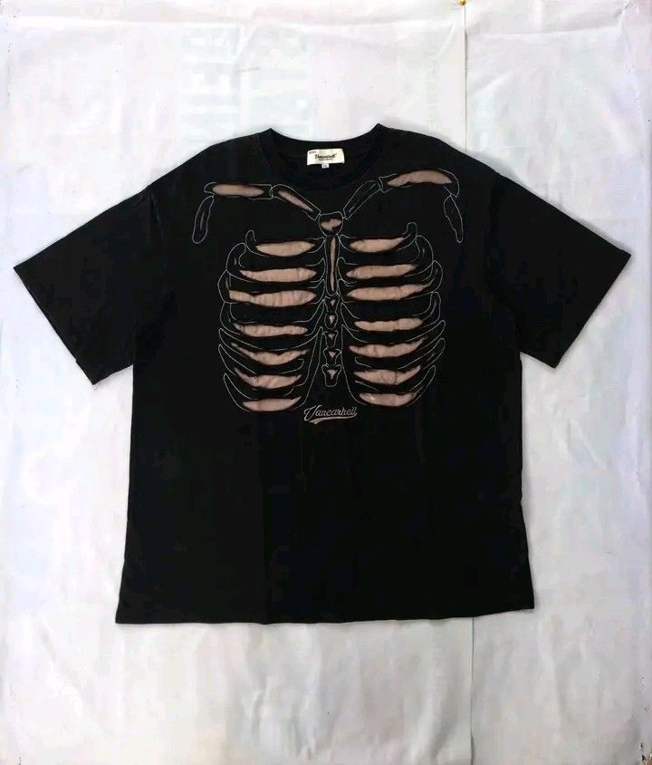 Vancarhell "Skeleton Ribcage" Black Tee (2XL) (Category: Tshirts & Polo Shirts ) located in Cebu City. Submitted by babradede215 (Listing ID 1465911976, Image 1). Description: Length : 31 Width : 27 Color Rate : 9.9/10 Issue : Repair Pinholes.