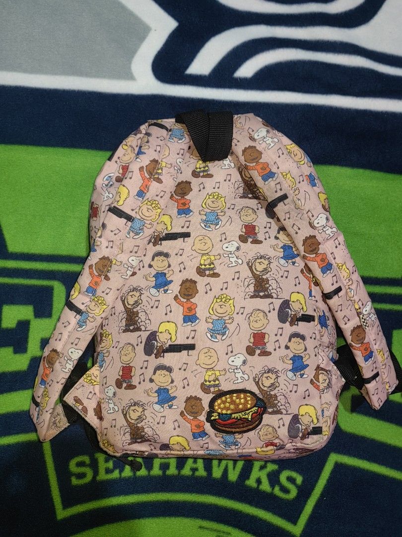 Vans x Peanuts Dance Party Calico Pink Mini Back Pack (Category: Backpacks) located in Tuguegarao City. Submitted by ekko_bag2 (Listing ID 1465904370, Image 3). Description: In Very Good condition -All over print of Peanuts Gang - Pastel Pink - Needs wash, patched (burger) cigarette burn hole, See photo Mode of payment - Gcash Payment first, No COD Shipping thru JNT (next day shipping) ***Please manage your expectations as this is a thrifted auth