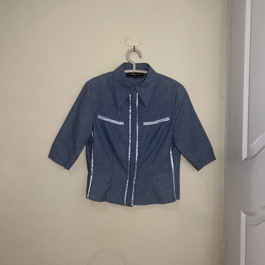 Vermonte Blue Soft Denim Collared Polo Blouse (Category: Blouses) located in Marikina City. Submitted by preloved.mana (Listing ID 1465944943, Image 2). Description: - Brand: Vermonte - medium on tag but fits small better - Structured fit, Soft denim material - still has tag - MOP: gcash, maya - MOD: jnt, lalamove - LOC: marikina.
