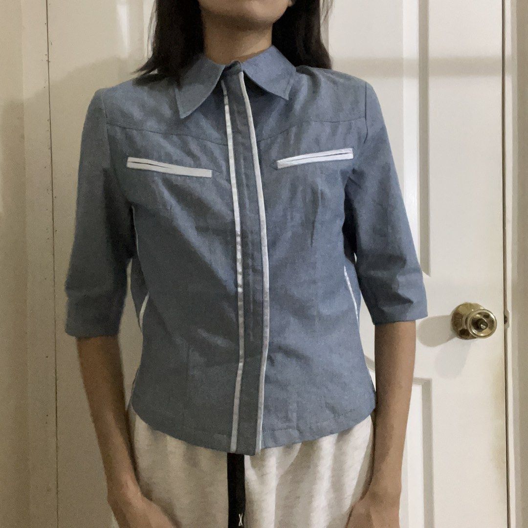 Vermonte Blue Soft Denim Collared Polo Blouse (Category: Blouses) located in Marikina City. Submitted by preloved.mana (Listing ID 1465944943, Image 1). Description: - Brand: Vermonte - medium on tag but fits small better - Structured fit, Soft denim material - still has tag - MOP: gcash, maya - MOD: jnt, lalamove - LOC: marikina.