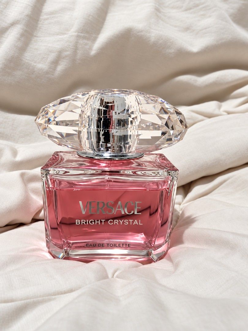 Versace Bright Crystal Eau de Toilette (Category: Fragrance & Deodorants) located in Quezon City. Submitted by thriftshopmar (Listing ID 1465885295, Image 1). Description: - Item: Versace Bright Crystal Eau de Toilette - Condition:Almost Full bottle, stored properly away from direct sunlight - Bottle: Pink glass with large faceted crystal cap, intact silver-tone hardware and clear front labeling - Scent Profile: Fresh floral - Guaranteed authenti