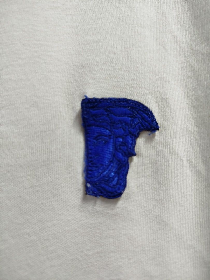 VERSACE EMBROIDERED HALF FACE LOGO SHIRT (Category: Briefcases) located in Bayombong. Submitted by Gentlemans_ClosEt (Listing ID 1465807963, Image 3). Description: VERSACE EMBROIDERED HALF FACE LOGO SHIRT SIZE.