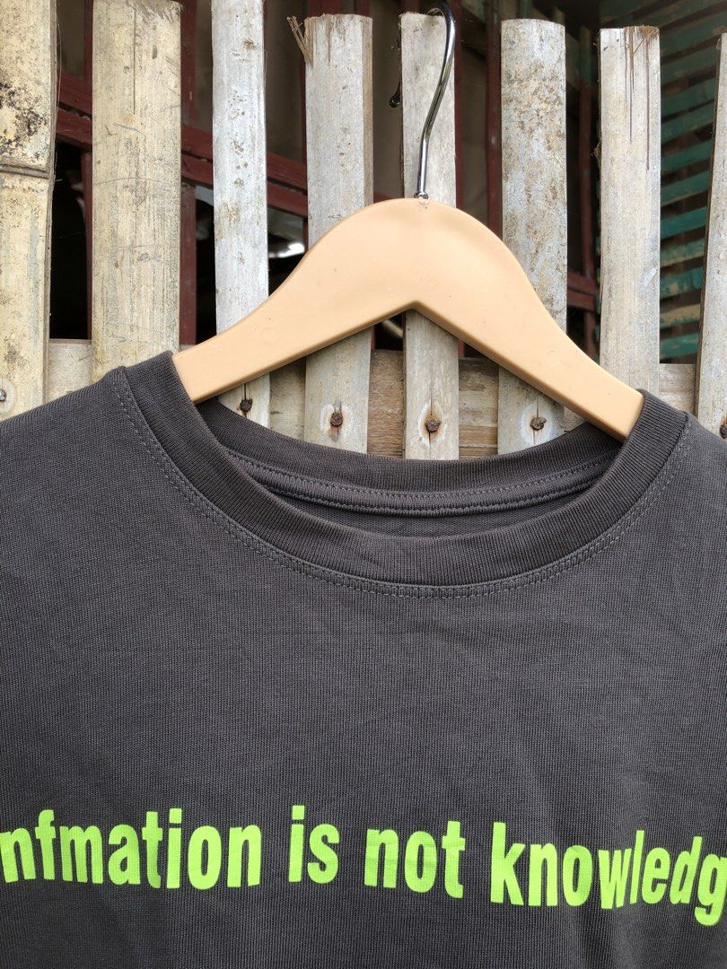 Vetements (Category: Formal Shirts) located in Santa Catalina. Submitted by marlonsecondclosett (Listing ID 1465829474, Image 3). Description: dark grey Vetements slogan t-shirt with lime green text. no tags but solid ng tila napaka ganda ng neckline.