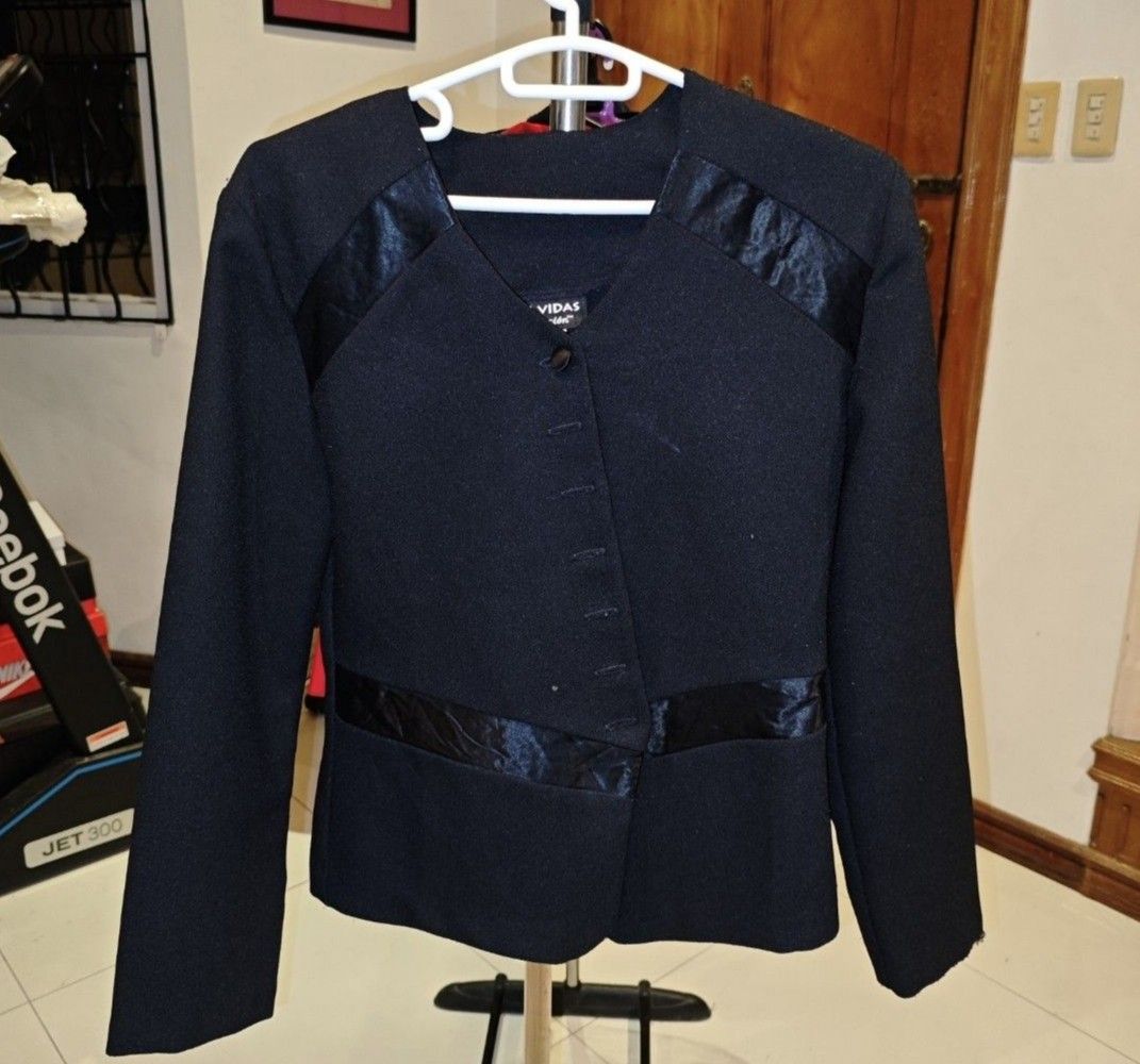 VIDAS Black Blazer with Satin Accents (Category: Coats, Jackets and Outerwear) located in Iloilo. Submitted by teezeewhyyy (Listing ID 1465934964, Image 1). Description: - Brand: VIDAS - Color: Solid black - Fit: Tailored fit with long sleeves - Design: Satin panel details across shoulders and lower waist - Closure: Asymmetric front button with multiple decorative loops - Condition: Excellent / Pre-loved (ready to wear) - Mode of payment: GCash /