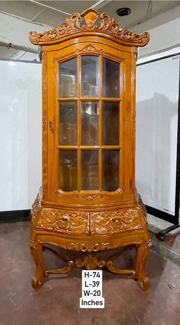 Vintage Baroque Display Cabinet (Category: Shelves, Cabinets & Racks) located in Quezon City. Submitted by dannikkishoppe2 (Listing ID 1465869792, Image 2). Description: Vintage Baroque Display Cabinet ‼️₱38000‼️ Beautiful carved details, glass doors, and elegant antique-style finish—perfect pang-display ng collections, figurines, glassware, or special items. ✨ 📏 H-74” | L-39” | W-20” 🇯🇵 Japan Surplus Quality 💯 Elegant • Unique • Eye-catching