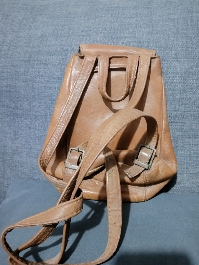Vintage Brown Leather Mini Backpack (Category: Backpacks) located in Hermosa. Submitted by chic2315 (Listing ID 1465878767, Image 2). Description: Vintage leather mini backpack. Cute size. This is a vintage bag so expect some signs of use and scratches, but still useable. .
