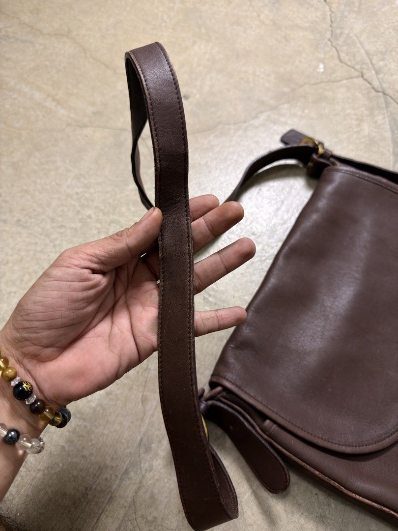 Vintage Coach Whitney Bag (Category: Luxury Bags & Wallets) located in Alfonso. Submitted by jbcamet (Listing ID 1465921231, Image 3). Description: - Authentic vintage Coach crossbody bag in rich dark brown leather - Classic flap closure with a soft suede interior lining - Features sturdy brass hardware and the original Coach hangtag - Adjustable strap for a comfortable, customizable fit - Natural wear along the edges adds unique vintage characte