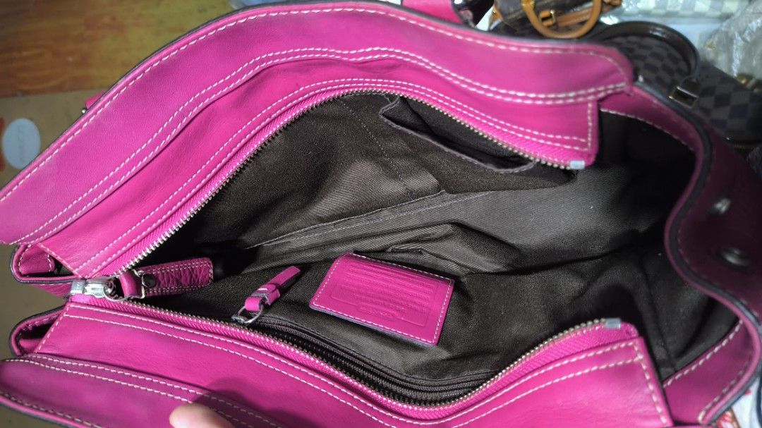 Vintage Coach Hamilton Shoulder Bag (Category: Luxury Bags & Wallets) located in Quezon City. Submitted by 88bagelya_ni_rhen88 (Listing ID 1465547333, Image 2). Description: - Authentic Coach handbag in vibrant bright pink pebbled leather - Secure front flap with classic turnlock closure - Comfortable dual shoulder straps with chic contrast white stitching - Sleek silver-tone hardware and matching leather side hangtag - Structured bottom corners 