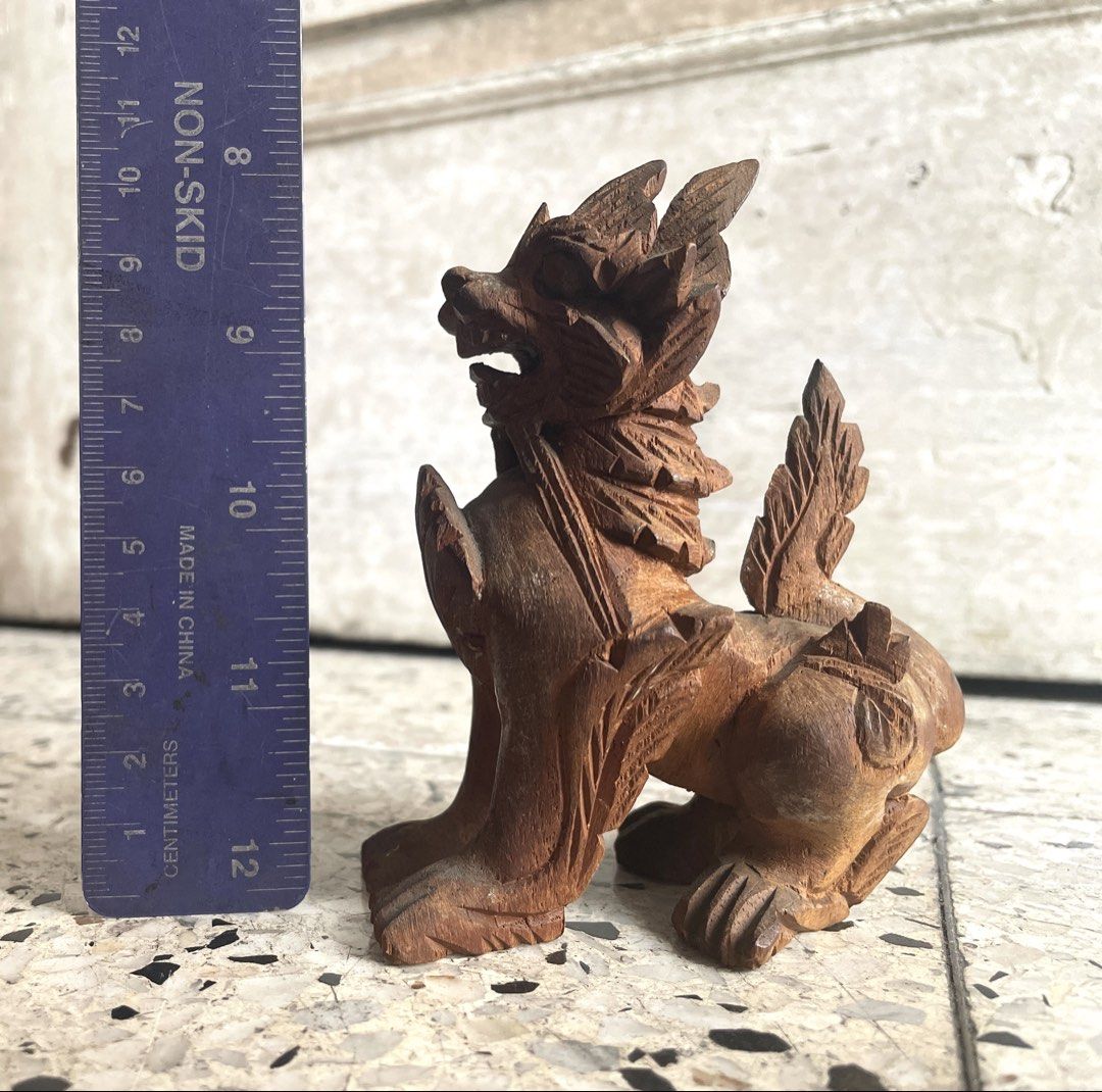 Vintage handcarved Foo Dog / Chinthe (Category: Figurines & Statues) located in Quezon City. Submitted by liama (Listing ID 1465808981, Image 1). Description: Vintage handcarved wooden guardian lion Symbol of prosperity ( "fu"); open-mouthed for protection from evil spirits Likely from 60s < 2-day reservation period; BDO/GCash; buyer books/pays for pick up : QC: EDSA-GMA area, OR if u r in vicinity i cn jst hand it over to u>.