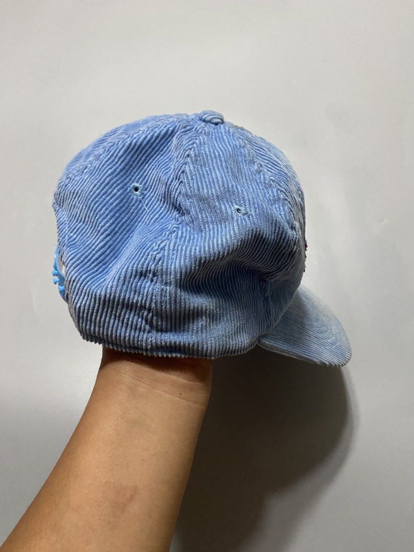 Vintage Keystone Blue Corduroy Snapback Cap (Category: Caps & Hats) located in Manila. Submitted by delunakenn94368 (Listing ID 1465904221, Image 2). Description: - Style: Casual streetwear / vintage aesthetic - Material: Light blue corduroy with white inner lining and sweatband - Design: Embroidered Keystone logo in red and light blue - Closure: Adjustable plastic snapback - Condition: Minor wear and slight fading around the brim from regular us