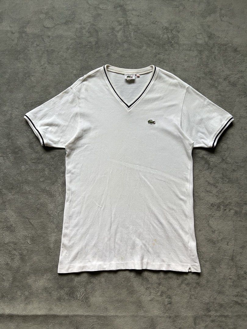 Vintage Lacoste Vneck Shirt (Category: Tshirts & Polo Shirts ) located in Manila. Submitted by wenttttt (Listing ID 1465945029, Image 1). Description: 19 x 29 Issue : yellow stain.