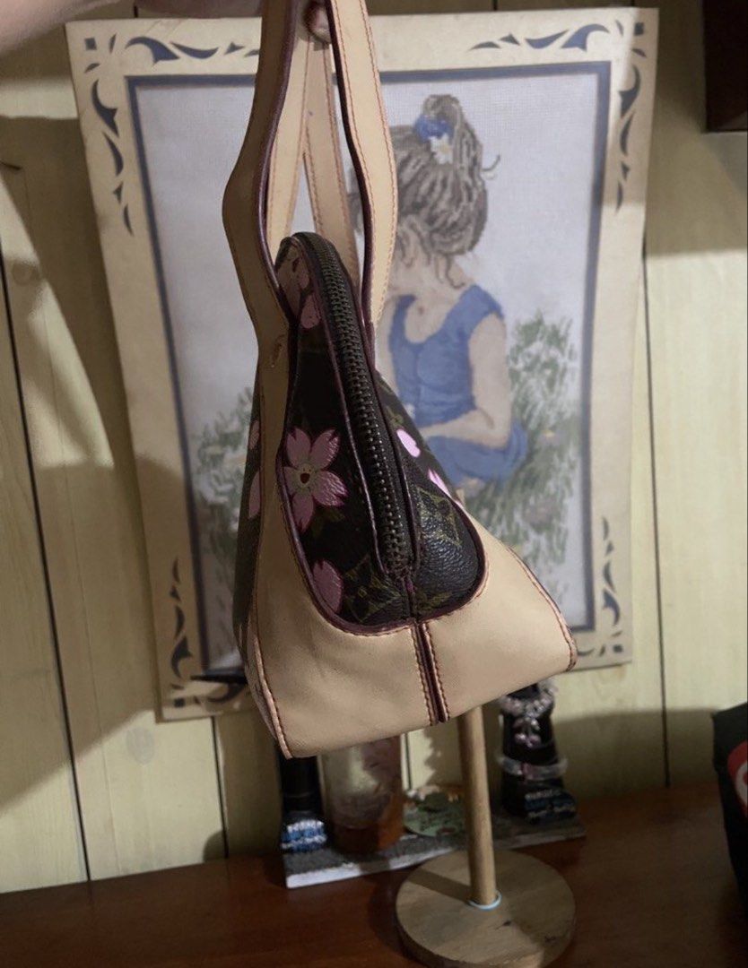 Vintage Louis Vuitton Monogram (Category: Luxury Bags & Wallets) located in Manila. Submitted by seductivelove_xo (Listing ID 1465948975, Image 3). Description: - Brand: Louis Vuitton - Model: Cherry Blossom Bowler Bag - Material: Monogram canvas with vachetta leather trim and pink cherry blossom floral print - Features: Dual top handles, top zip closure, interior pocket with Louis Vuitton Paris stamp, and four protective metal feet on the base -