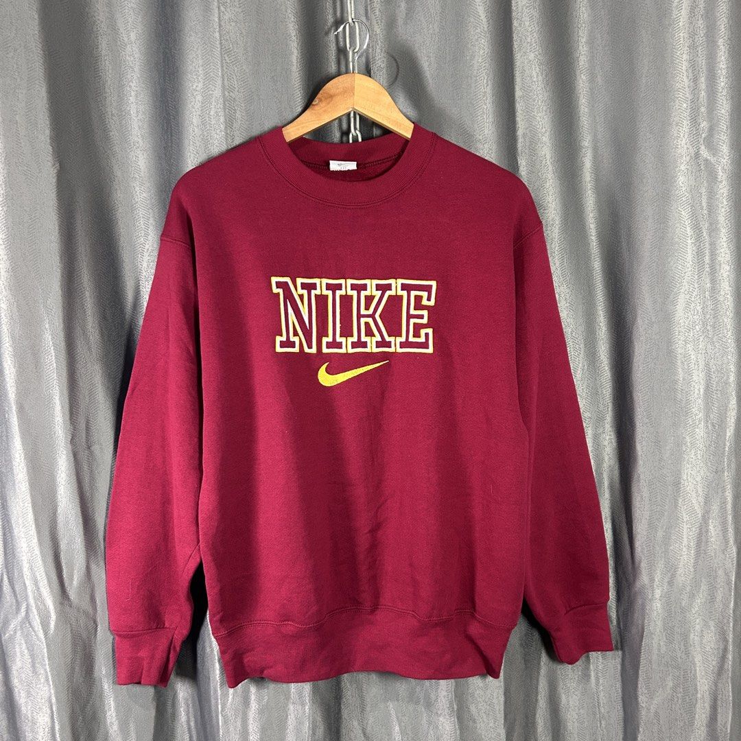 VINTAGE NIKE EMBROIDERED SWEATSHIRT (Category: Coats, Jackets and Outerwear) located in General Mariano Alvarez. Submitted by manosegunda4117 (Listing ID 1465923854, Image 1). Description: VINTAGE NIKE EMBROIDERED SWEATSHIRT Measurements: Width - 21 in Length - 26 in Colour: Maroon Excellent Condition Price : PHP 2,000 + shipping fee 📍GMA, Cavite .