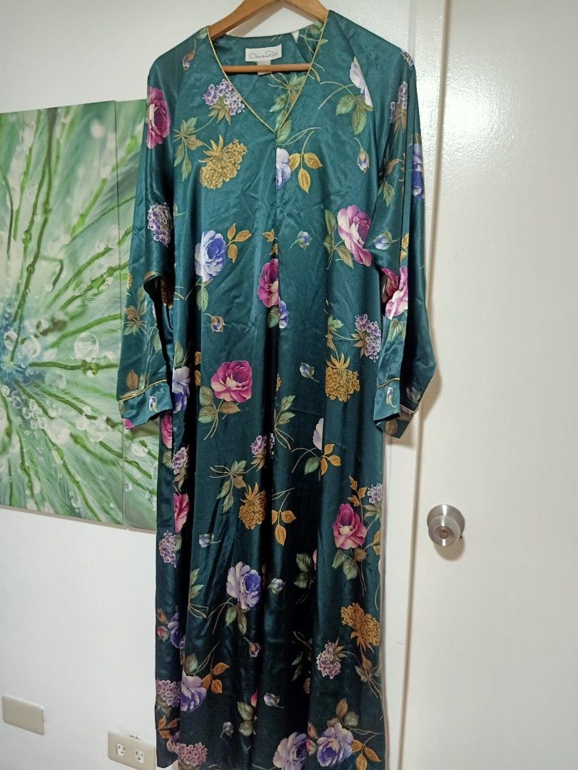 Vintage Oscar Dela Renta (Category: Dresses) located in Mandaluyong City. Submitted by miyakiko (Listing ID 1465903632, Image 3). Description: Selling vintage Oscar de la Renta silk floral kaftan / lounge dress, a signature style from the designer's sleepwear and lounger archives. It features a dark emerald green or teal base adorned with a multi-colored botanical print of roses and hydrangeas, complemented by classic gold-toned piping along the 