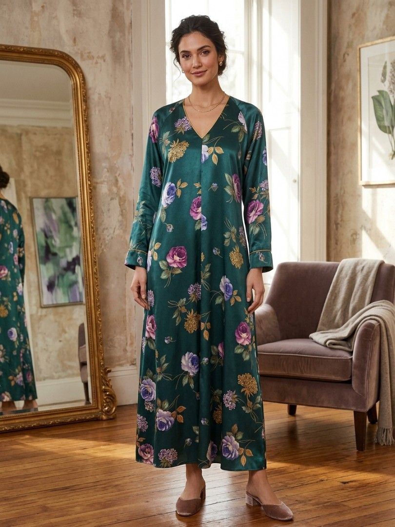 Vintage Oscar Dela Renta (Category: Dresses) located in Mandaluyong City. Submitted by miyakiko (Listing ID 1465903632, Image 2). Description: Selling vintage Oscar de la Renta silk floral kaftan / lounge dress, a signature style from the designer's sleepwear and lounger archives. It features a dark emerald green or teal base adorned with a multi-colored botanical print of roses and hydrangeas, complemented by classic gold-toned piping along the 
