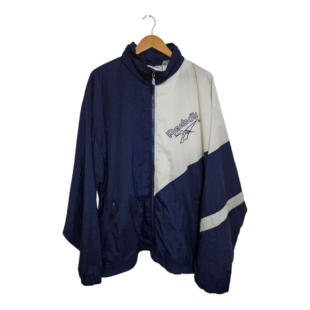 Vintage reebok windbreaker (Category: Coats, Jackets and Outerwear) located in Baguio. Submitted by fadexquisite (Listing ID 1465774761, Image 2). Description: Vintage reebok windbreaker Large fits xlarge 29x27 Very good condition Issue small paint stain on right sleeve 400 plus ship fee.