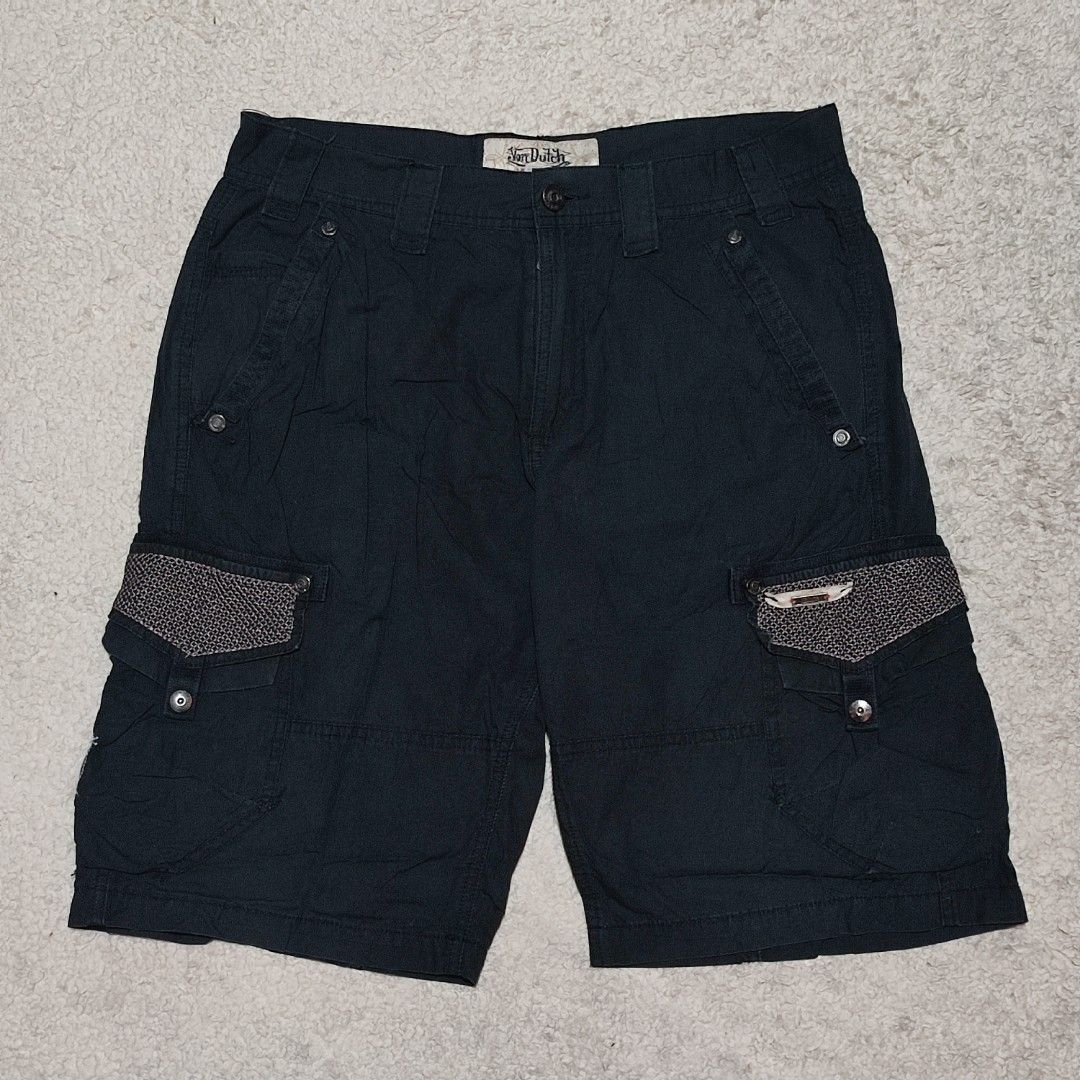 Von Dutch black cargo shorts with patterned pockets (Category: Shorts) located in Manila. Submitted by anthonig (Listing ID 1465868264, Image 1). Description: Length: 23 inches Width: 33 inches Hem: 11 inches Price: 300 pesos Condition: 9/10 Issues: last photo (inside pocket) PM if interested or for inquiries Meetups within MANILA only Can do shipping at buyers expense.