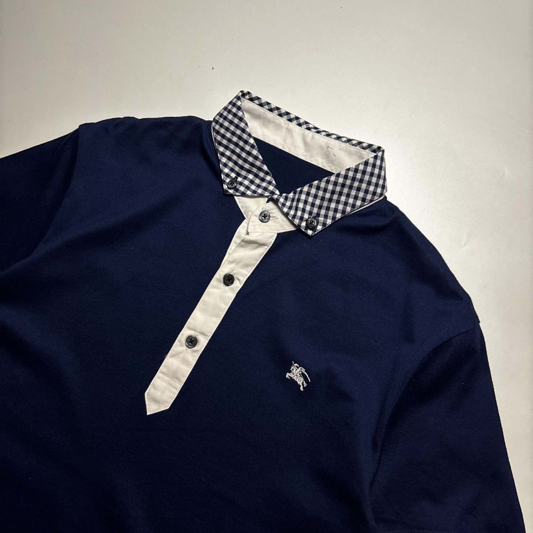 VTG Burberrys Navy Nova Check Polo (Category: Tshirts & Polo Shirts ) located in San Pablo. Submitted by refitsph (Listing ID 1465811609, Image 2). Description: - Width: 17.5 - Length: 26.5 - Legit / Authentic - Flawless ( cut tags ) - Already Washed and Ready to Wear.