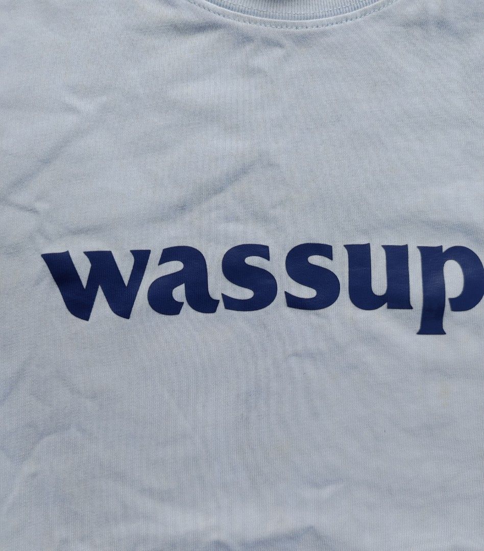 Wassup Script Logo Tee (Category: Tshirts & Polo Shirts ) located in Muntinlupa City. Submitted by lokalthriftco. (Listing ID 1465826295, Image 3). Description: Size L Heavy Cloth Yellow stains, Stains Need wash Good condition.