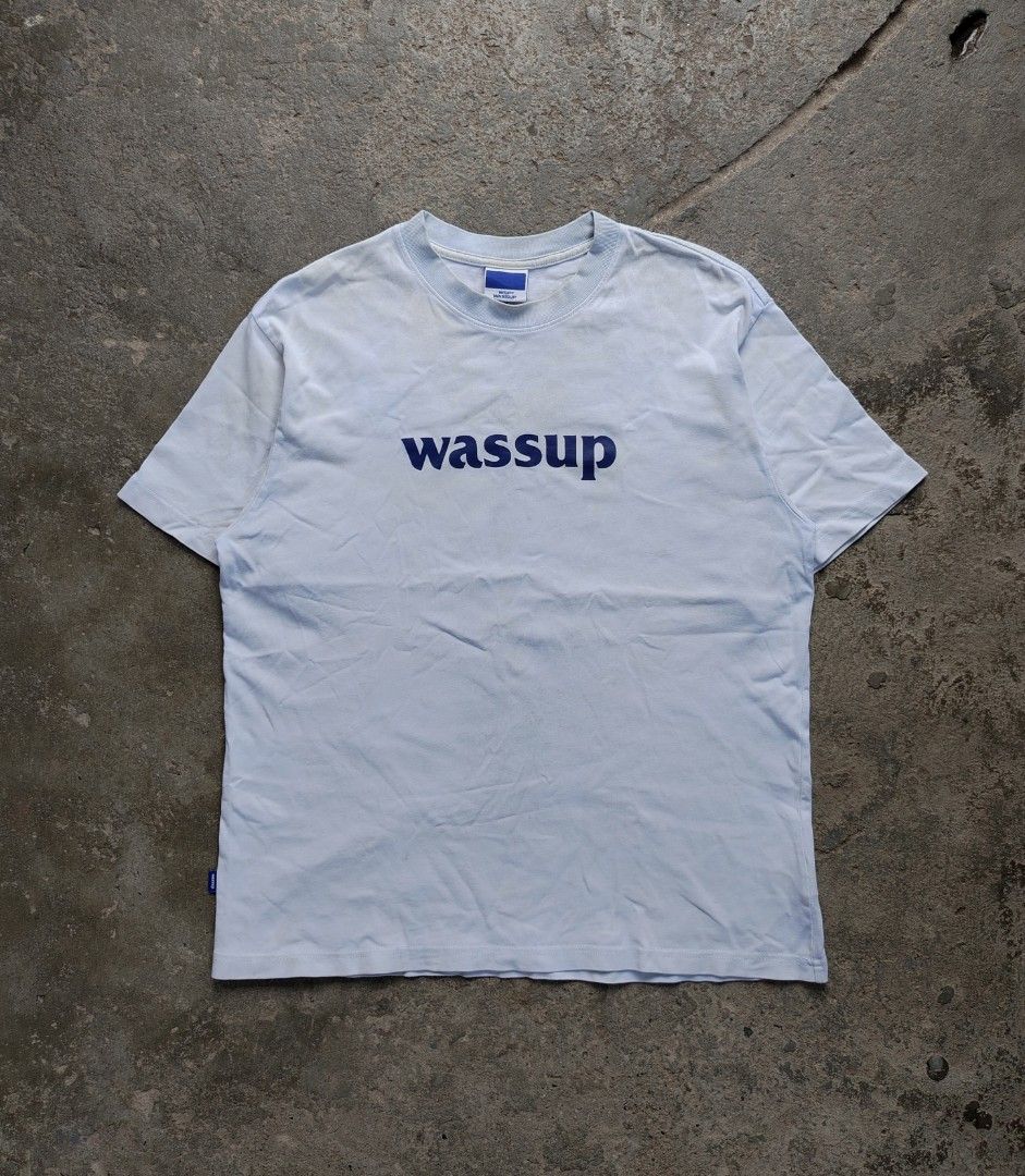 Wassup Script Logo Tee (Category: Tshirts & Polo Shirts ) located in Muntinlupa City. Submitted by lokalthriftco. (Listing ID 1465826295, Image 1). Description: Size L Heavy Cloth Yellow stains, Stains Need wash Good condition.