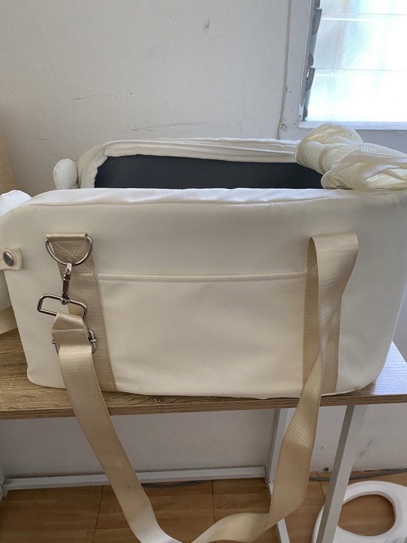 White Bear Pet Car Seat Bag (Category: Homes & Other Pet Accessories) located in Calamba. Submitted by matiasjannine (Listing ID 1465818641, Image 3). Description: - Adorable white bear design with floppy ears and stitched face details - Versatile 2-in-1 function: use as a pet carrier or a car seat - Comfortable for your pet with soft inner padding and a breathable top mesh opening - Easy to carry with adjustable shoulder straps - Condition: Mino