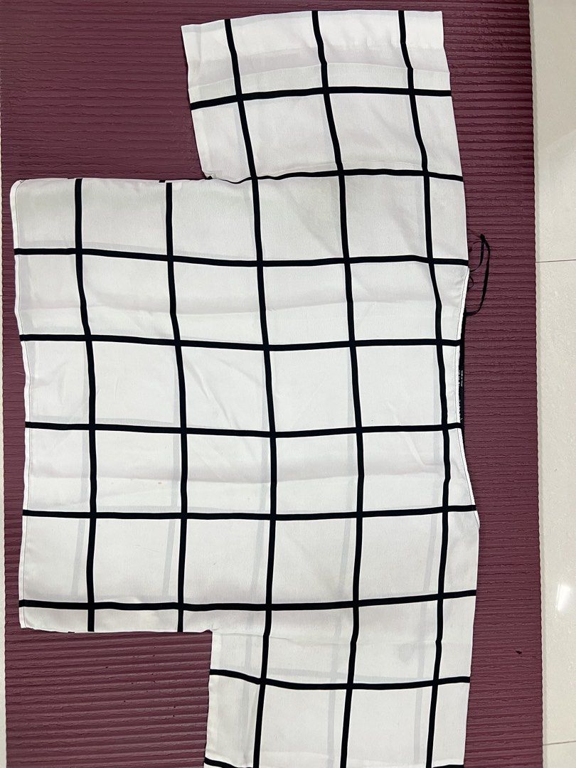 White Black Windowpane Grid Boxy Short Sleeve Top (Category: Shirts) located in Manila. Submitted by imprincessg888 (Listing ID 1465845988, Image 1). Description: - Style: Boxy, loose fit short sleeve top - Pattern: Bold black windowpane check grid - Material: Lightweight and comfortable fabric - Versatility: Easy to match with jeans or skirts - Condition: Brand new / Excellent.
