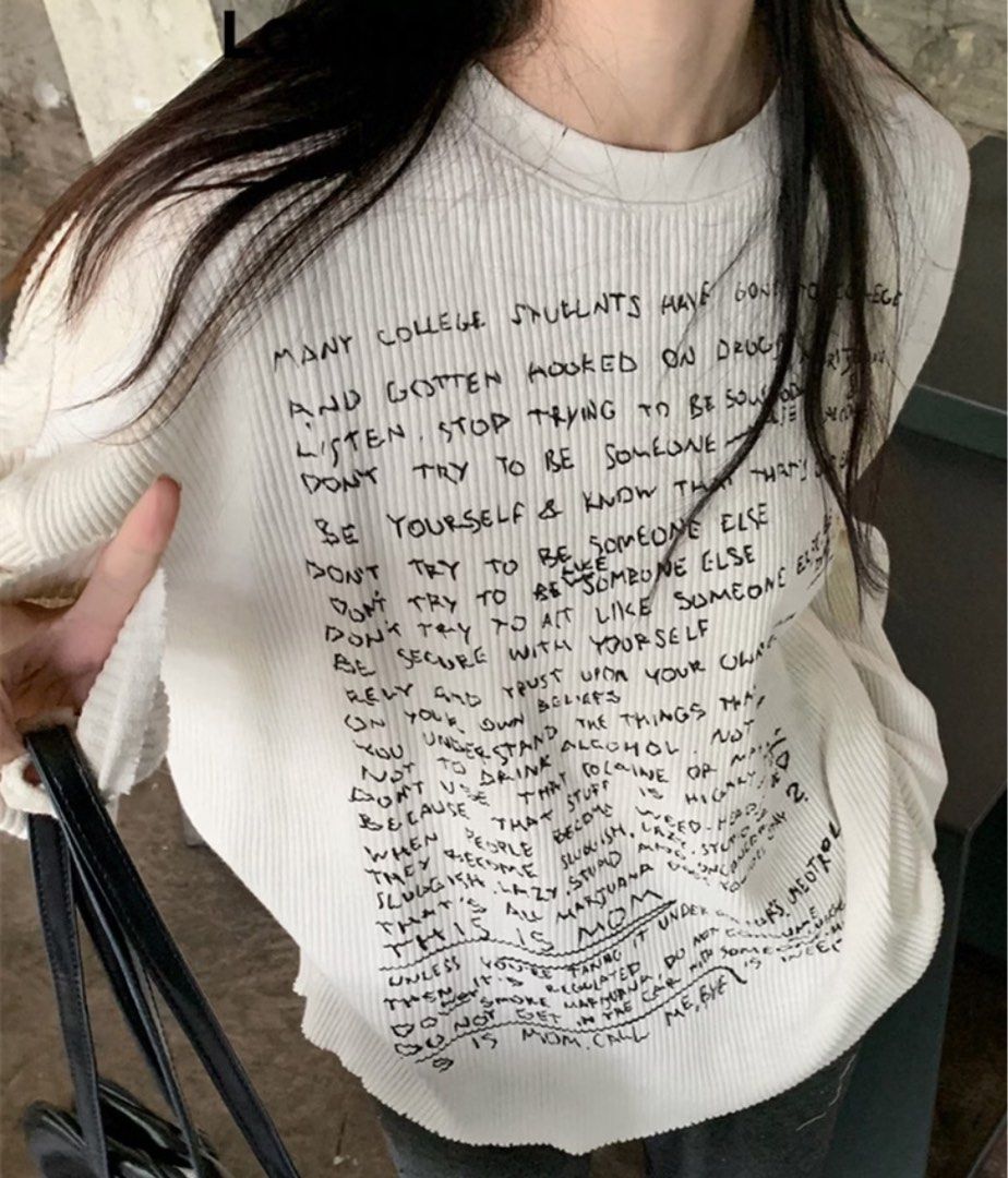 White Graphic Longsleeve (Category: Longsleeves) located in Manila. Submitted by lueur000 (Listing ID 1465937637, Image 1). Description: Large Front Length - 70/26 Bust - 120/47 Shoulder Width - 58.5/23 Sleeve Length - 51/20.