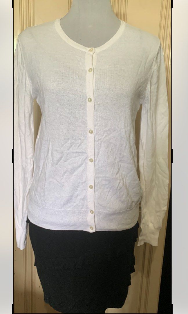 White knitted long sleeve button-up cardigan (Category: Coats, Jackets and Outerwear) located in Quezon City. Submitted by clothingline4sale (Listing ID 1465898316, Image 1). Description: White Button Down Cardigan Very good condition/ like new Stretchy/ Soft fabric/ not itchy Size: medium- semiLarge Bust: 38-44” ; Length: 23” ; Arms Circumference/ 14-18” Very nice in actual .