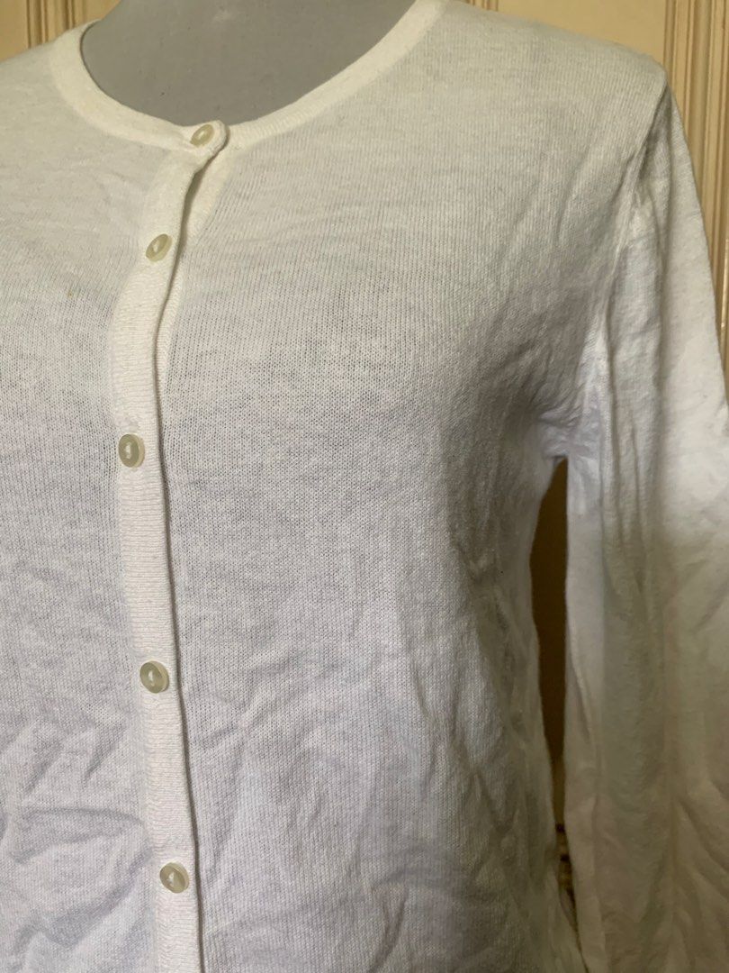 White knitted long sleeve button-up cardigan (Category: Coats, Jackets and Outerwear) located in Quezon City. Submitted by clothingline4sale (Listing ID 1465898316, Image 3). Description: White Button Down Cardigan Very good condition/ like new Stretchy/ Soft fabric/ not itchy Size: medium- semiLarge Bust: 38-44” ; Length: 23” ; Arms Circumference/ 14-18” Very nice in actual .