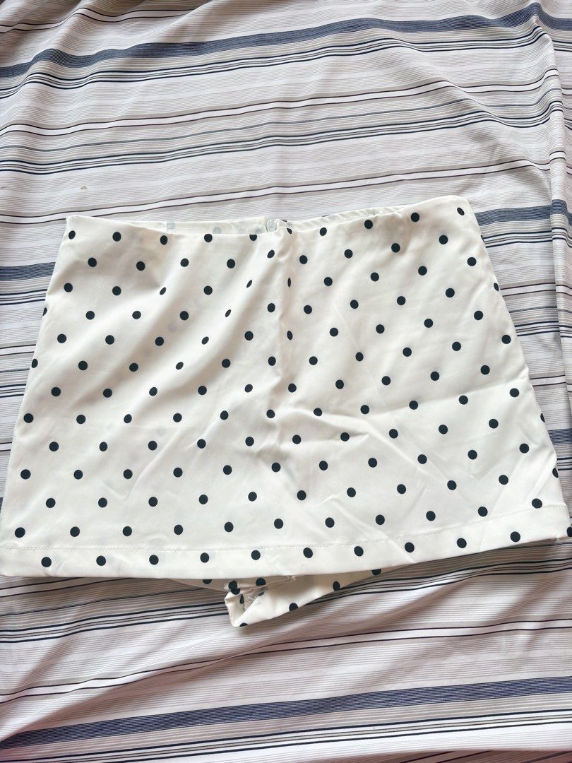 White Polka Dot Skorts - Vietnam (Category: Skirts) located in Bacoor. Submitted by koomitushi (Listing ID 1465913227, Image 1). Description: Best fit 26-28 waistline Has pocket - Color/Pattern: White with black polka dots - Features: Built-in shorts underneath, hidden front zipper closure - Fabric: Smooth with a bit of structure, great quality - Condition: Clean, no stains, no loose threads - Style: Casual, versatile, easy to match with plain to