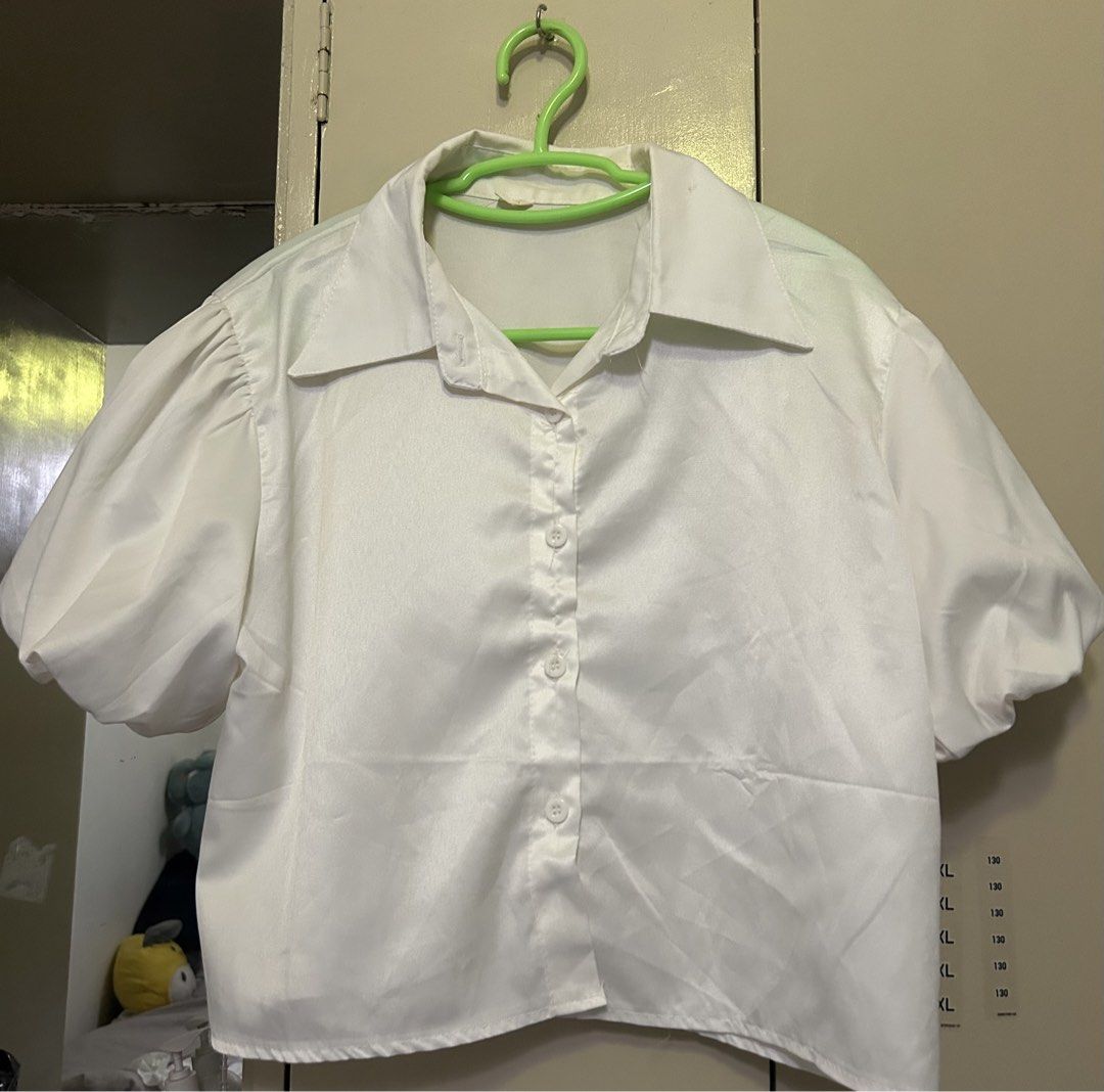 White Polo Top (Category: Blouses) located in Manila. Submitted by lueur000 (Listing ID 1465938031, Image 1). Description: Small.