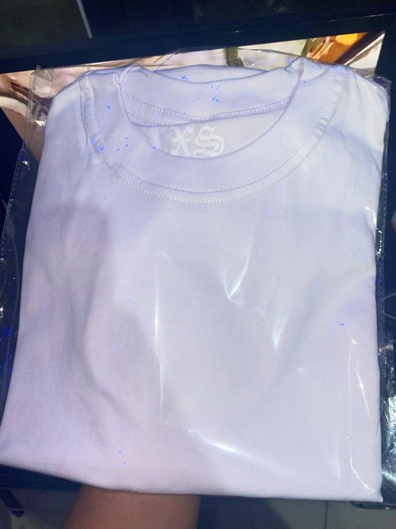 White T-Shirt Size XS (Category: Tshirts & Polo Shirts ) located in Taguig. Submitted by slime824 (Listing ID 1465822886, Image 1). Description: - Brand new & still sealed in original packaging - Size: XS -Size: S - Color: Solid white - Style: Classic crew neck, short sleeves - Condition: 10/10 pristine everyday basic tee.