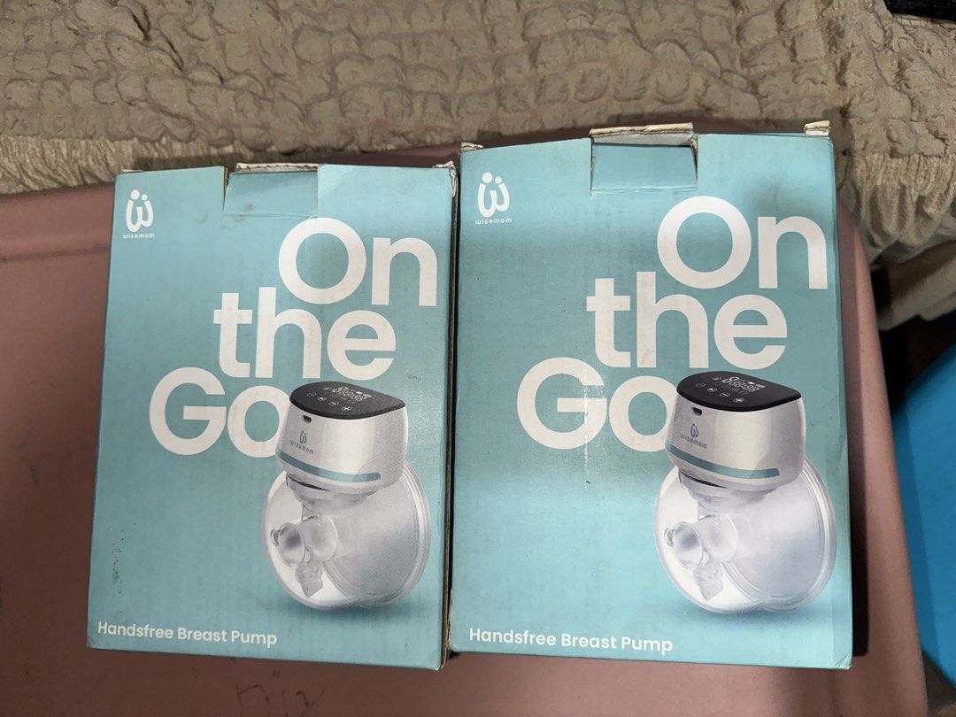 Wisemom On The Go Handsfree Breast Pump Double Set (Category: Breastfeeding & Bottle Feeding) located in Antipolo. Submitted by jhayniejhulia (Listing ID 1465769577, Image 1). Description: - Brand: Wisemom - Item: On The Go Handsfree Breast Pump Set - Included: 2 pump units, charger cables, straps, manuals, and original packaging boxes - Design: Wearable, cordless, and tubeless for ultimate convenience - Perfect for: Multitasking easily while wor