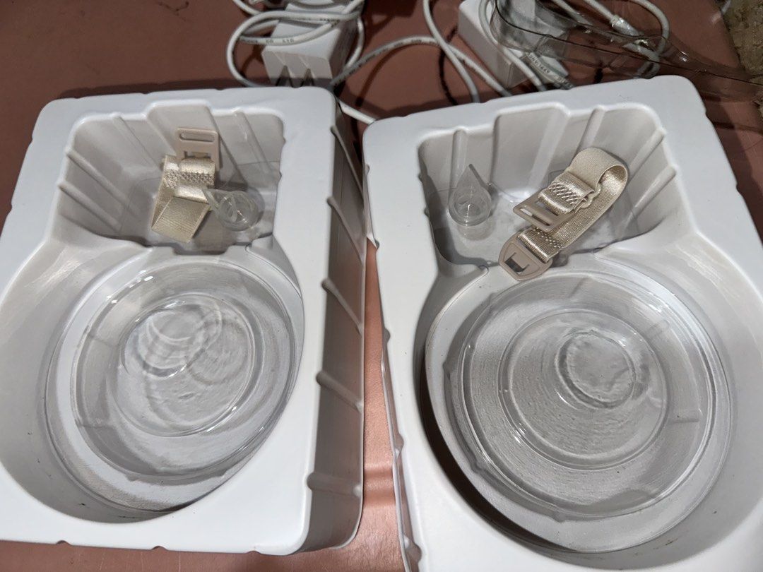 Wisemom On The Go Handsfree Breast Pump Double Set (Category: Breastfeeding & Bottle Feeding) located in Antipolo. Submitted by jhayniejhulia (Listing ID 1465769577, Image 3). Description: - Brand: Wisemom - Item: On The Go Handsfree Breast Pump Set - Included: 2 pump units, charger cables, straps, manuals, and original packaging boxes - Design: Wearable, cordless, and tubeless for ultimate convenience - Perfect for: Multitasking easily while wor