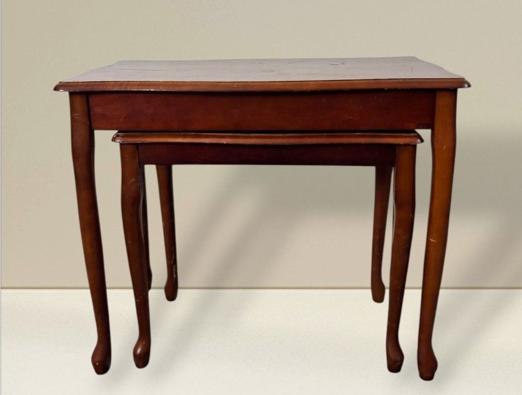 Wooden Nesting Side Table Set (Category: Tables & Sets) located in Quezon City. Submitted by dannikkishoppe2 (Listing ID 1465848866, Image 1). Description: Wooden Nesting Side Table Set ‼️₱4800‼️ Solid wood Used condition - some scuffs, scratches, dents • Finish: Rich brown with elegant curved legs • Ideal for: Small spaces and flexible living room styling Please manage your expectations as there might be minimal flaws. Color may vary due to ligh
