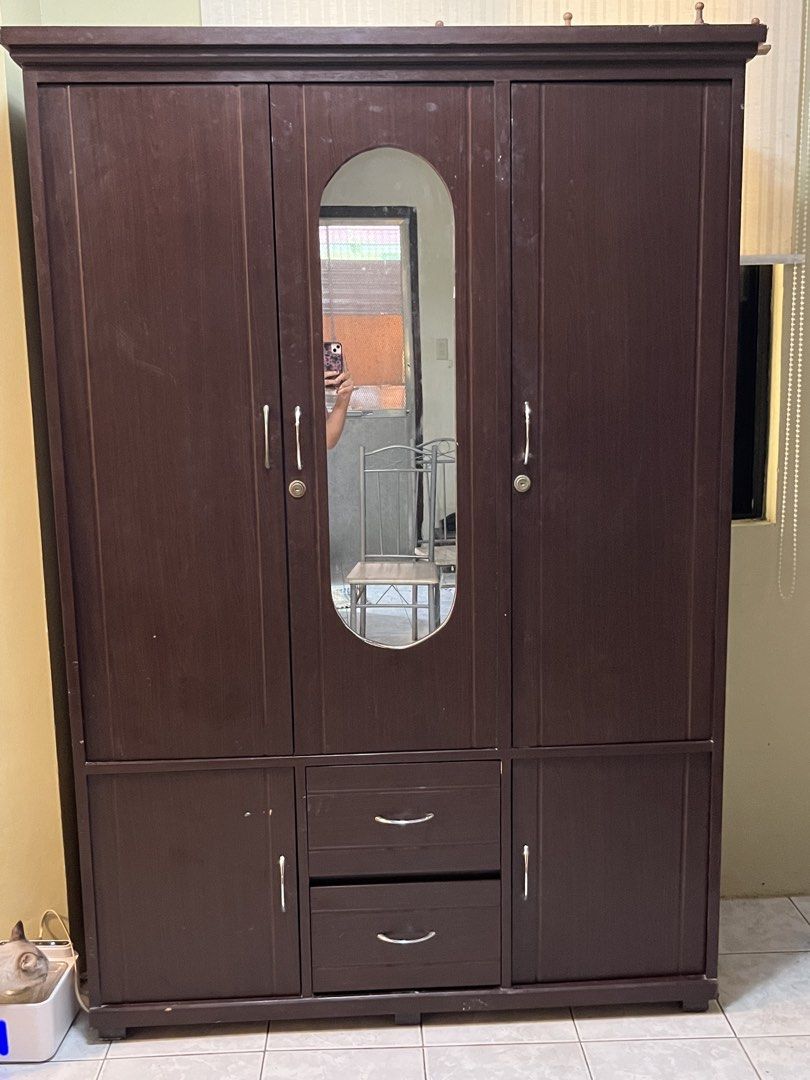 Wooden Wardrobe Cabinet (Category: Shelves, Cabinets & Racks) located in Dasmarinas. Submitted by stalirez (Listing ID 1465903663, Image 2). Description: Solid wood in good condition dimensions: H - 183cm L - 122cm W - 46cm Negotiable for sure buyers RFS: moved to a new house, hindi na po kasya sa room delivery: pick up or buyer-arranged courier.