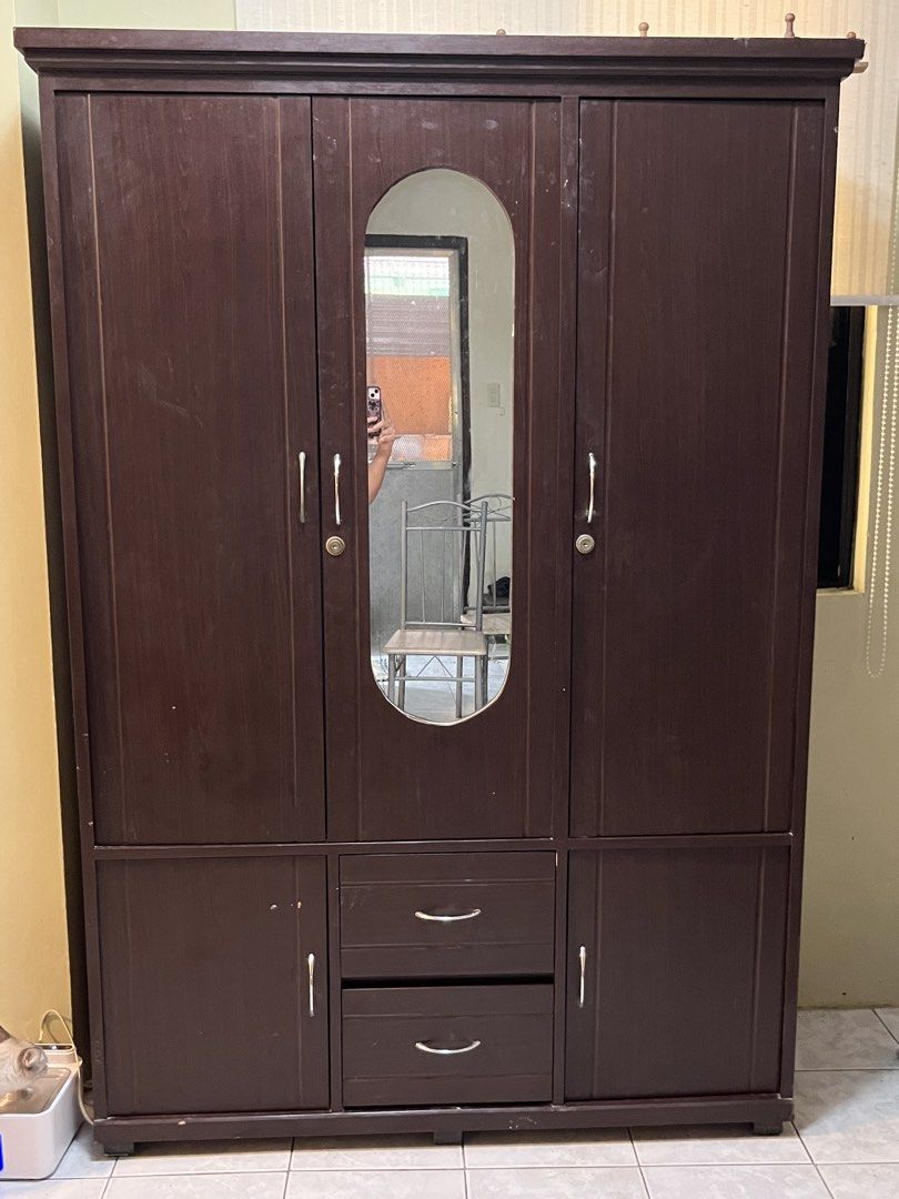 Wooden Wardrobe Cabinet (Category: Shelves, Cabinets & Racks) located in Dasmarinas. Submitted by stalirez (Listing ID 1465903663, Image 1). Description: Solid wood in good condition dimensions: H - 183cm L - 122cm W - 46cm Negotiable for sure buyers RFS: moved to a new house, hindi na po kasya sa room delivery: pick up or buyer-arranged courier.
