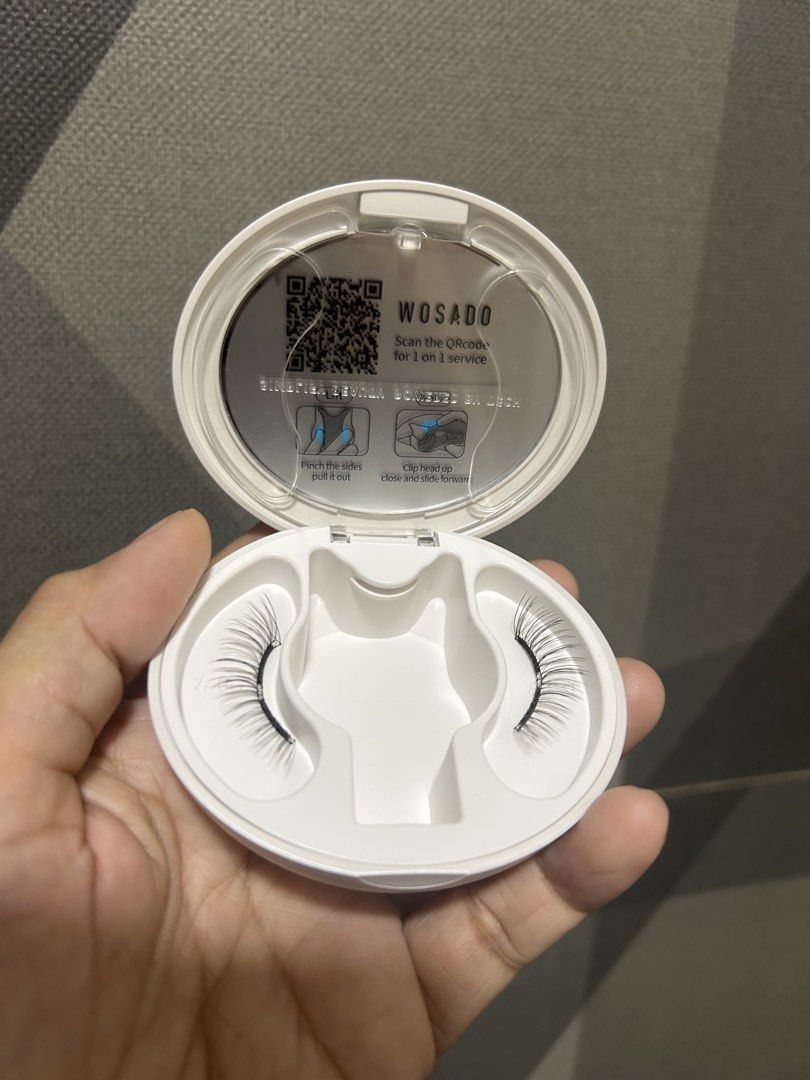 Wosado Magnetic Eyelashes with Applicator and Fixer (Category: Makeup) located in Manila. Submitted by 2025declutterring (Listing ID 1465817493, Image 3). Description: - Authentic Wosado magnetic eyelashes set - Includes 1 pair of lashes and built-in applicator tool - Comes with eyelash fixer tube and instruction card - Packed in a clean white round storage case and grey pouch - Quick and easy application, perfect for everyday use.
