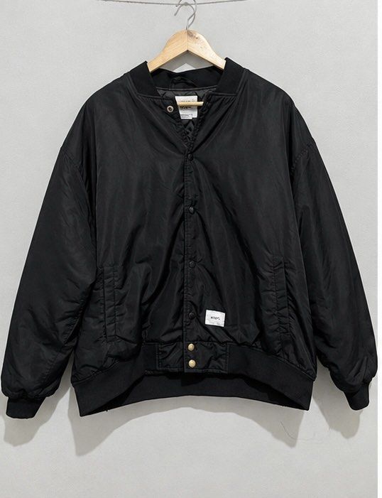 Wtaps 23AW crossbone (Category: Coats, Jackets and Outerwear) located in Muntinlupa City. Submitted by keaquintan94623 (Listing ID 1465843491, Image 1). Description: Wtaps 23AW crossbone 26x27 Shoulder 23.5 Excellent condition -4500 only Dm to purchase.