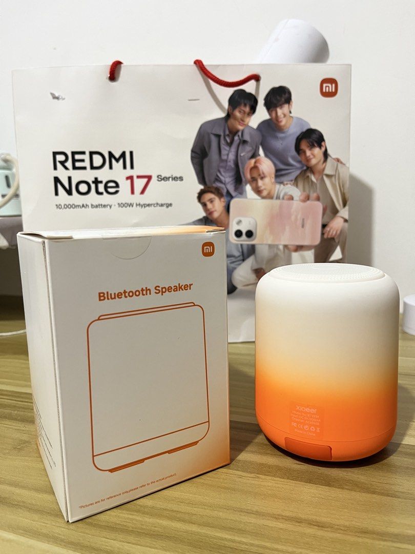 Xiaomi portable bluetooth Speaker (Category: Soundbars, Speakers & Amplifiers) located in Cavite. Submitted by cardibabe (Listing ID 1465937330, Image 1). Description: Xiaomi Bluetooth Speaker (Orange/White Gradient) 🍊 • Condition: Brand New / Complete with box and charging cable. • Features: Crisp audio performance, compact portable design, built-in lanyard/strap, and a sleek modern aesthetic. • Reason for Selling (RFS): Received as an official