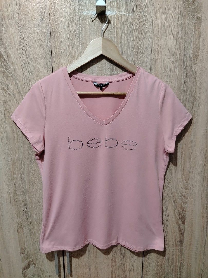 Y2K BEBE rhinestone (Category: Shirts) located in Plaridel. Submitted by orfdnix (Listing ID 1465903258, Image 1). Description: NIKE DRIFIT (big size) Width: 38-50 Length: 14 Like new condition 499 Loc: bulacan.