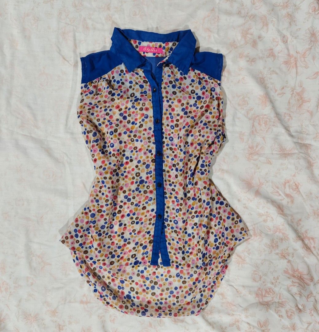 y2k style mesh blue multicolored polka dot pattern sleeveless button-down blouse (Category: Blouses) located in Bulacan. Submitted by angel.decluttersx (Listing ID 1465864843, Image 1). Description: m-l size mesh fabric material no issue.