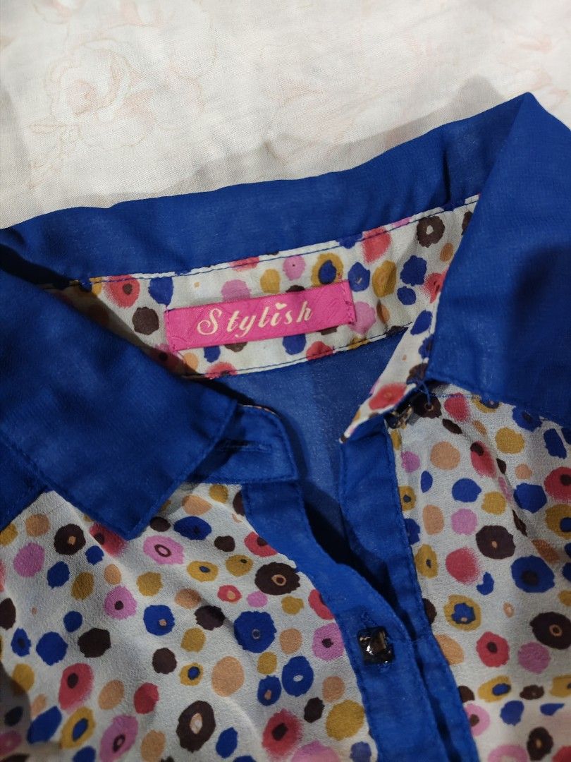 y2k style mesh blue multicolored polka dot pattern sleeveless button-down blouse (Category: Blouses) located in Bulacan. Submitted by angel.decluttersx (Listing ID 1465864843, Image 2). Description: m-l size mesh fabric material no issue.
