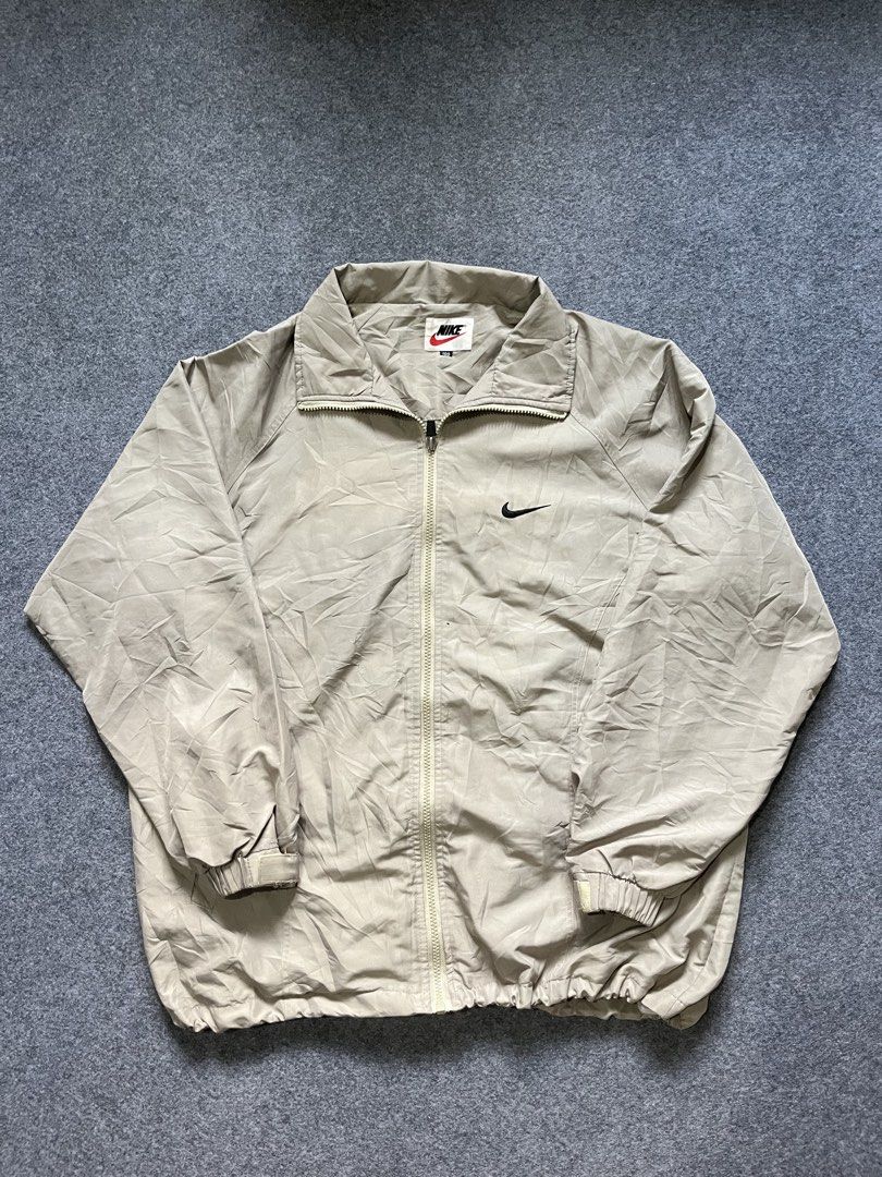 Y2K vintage Nike windbreaker (Category: Coats, Jackets and Outerwear) located in Lapu Lapu. Submitted by jhonrener41426 (Listing ID 1464570545, Image 1). Description: Size large Dimes 24x28 Excellent condition Color rate 9.7/10 Authentic Issue last pic minor .