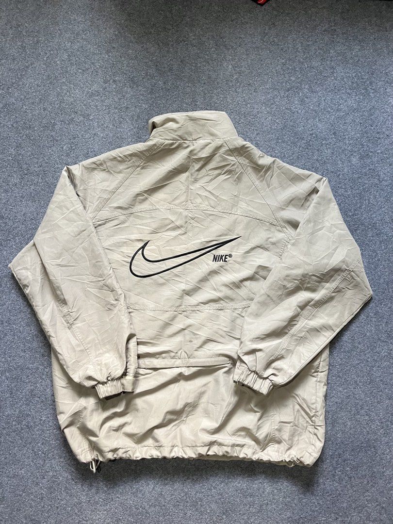 Y2K vintage Nike windbreaker (Category: Coats, Jackets and Outerwear) located in Lapu Lapu. Submitted by jhonrener41426 (Listing ID 1464570545, Image 2). Description: Size large Dimes 24x28 Excellent condition Color rate 9.7/10 Authentic Issue last pic minor .