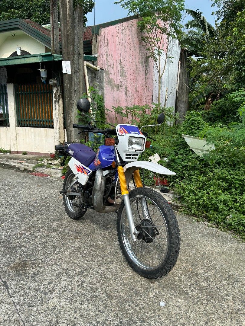 Yamaha DT 125 (Category: Motorbikes for Sale) located in Caloocan City. Submitted by cocobitz_ (Listing ID 1465895209, Image 2). Description: Selling Road Legal Yamaha DT 125 2005 Model - All stock engine - Never been trail, Road use only - Highway/Road Legal - Headlight, Signal Light, Horn, and switches are working - Autolube (2T Pump) Working - Complete OR/CR, with Deed of sale - Registered until July 2027 - Original Green Plate Selling Price: 