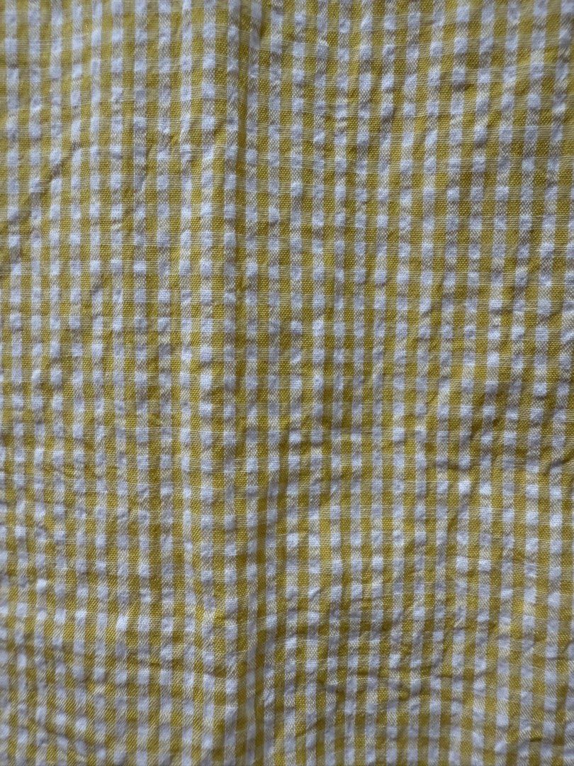 Yellow gingham sleeveless crop top with button back (Category: Sleeveless) located in Pasig City. Submitted by rchsh (Listing ID 1465820928, Image 3). Description: - Color/Pattern: Yellow and white gingham - Style: Sleeveless crop top with rounded neckline - Details: Back button closure with keyhole cutout - Material: Lightweight textured cotton - Condition: Clean and ready to wear.