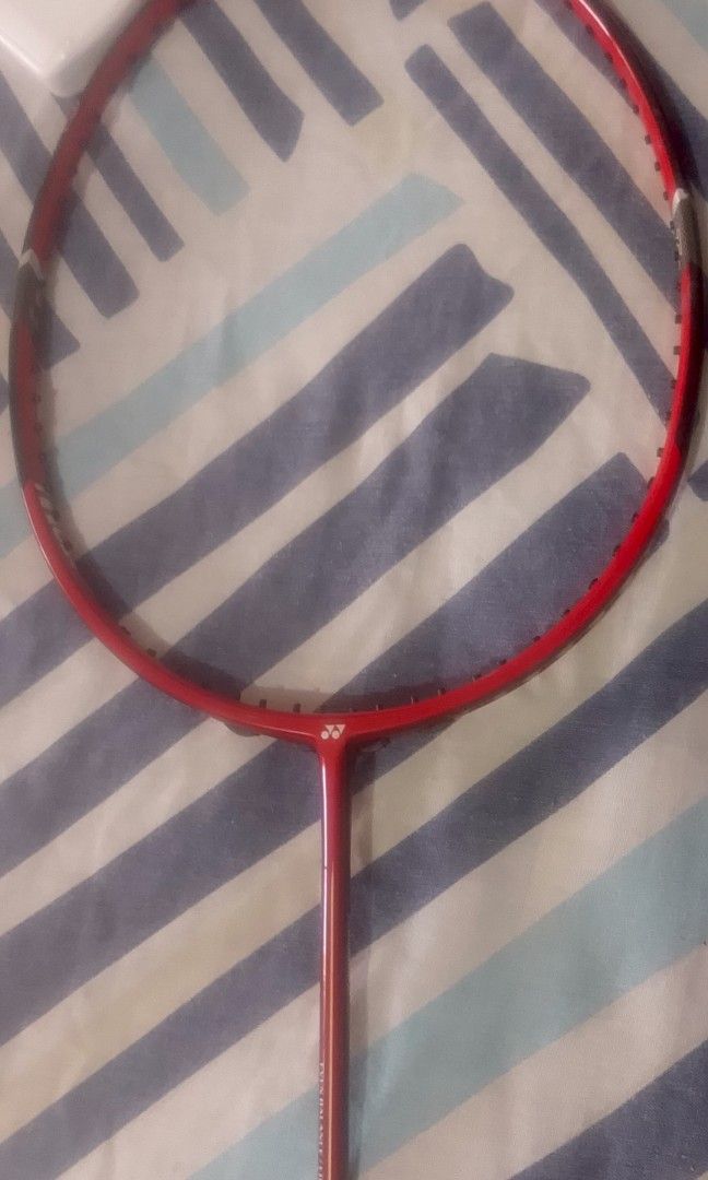 Yonex Muscle Power 100 SP Badminton Racket with Free Yonex Bag included!!! (Category: Racket and Ball Sports) located in Manila. Submitted by andypecho345843 (Listing ID 1465183649, Image 3). Description: - Price slightly negotiable for sure buyers!!! - Model: Yonex Muscle Power 100 SP - Origin: Made in Japan - Color: Red frame - Specs: Even balance design, long size configuration - Condition: Classic professional model with minor wear on the fra