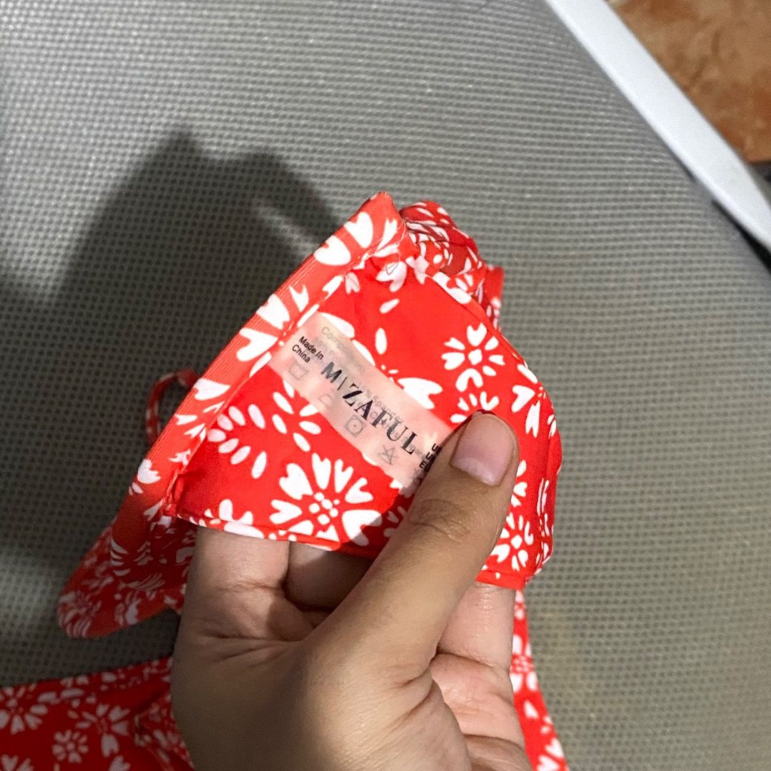 Zafu Floral Bikini (Category: Bikinis & Swimsuits) located in Antipolo. Submitted by annedeclutterss (Listing ID 1465891506, Image 3). Description: - Brand: Zaful - Small to Medium frame - Style: Bright red bikini set with all-over white floral print - Support: Built-in underwire in top cups - Fit: Adjustable back straps for a custom fit.
