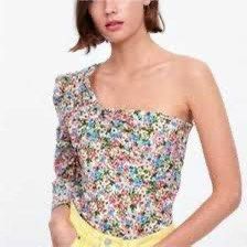 ZARA - Asymmetric Floral Print Top (Category: Longsleeves) located in Cebu City. Submitted by bnta.bnta (Listing ID 1465844261, Image 2). Description: Zara Asymmetric Floral Print Top featuring a one-shoulder design, a long sleeve on one side, and a vibrant multicolored floral pattern..